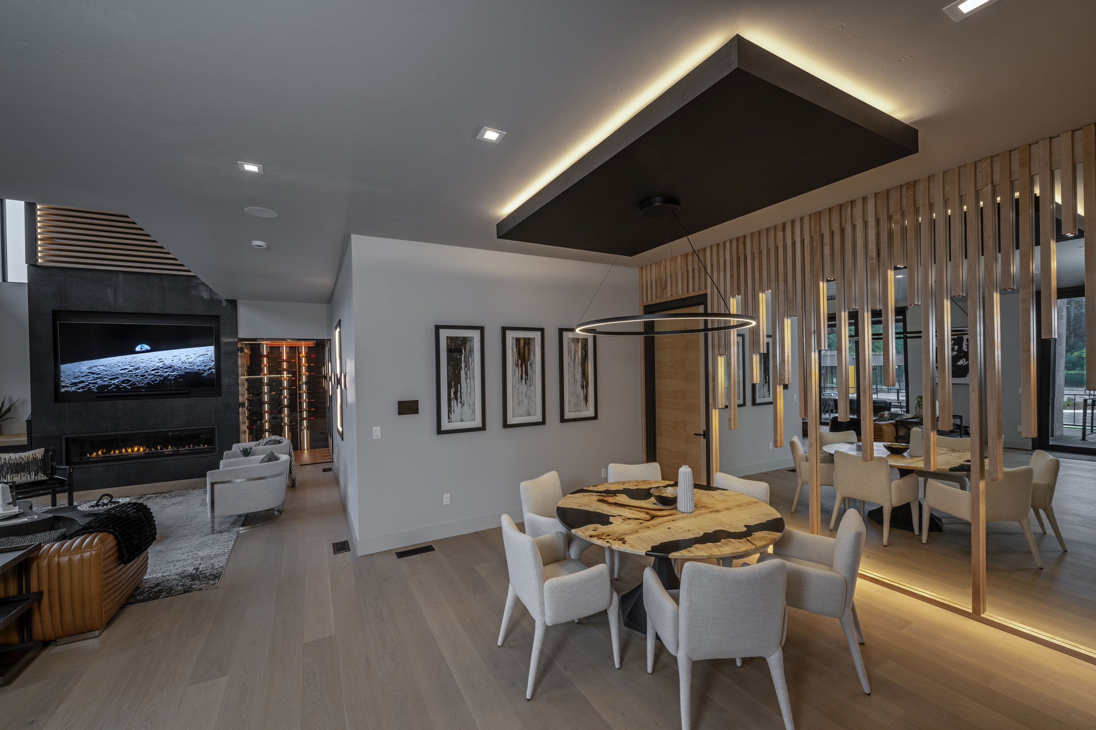 custom luxury dining room with ambient lighting and wood accents