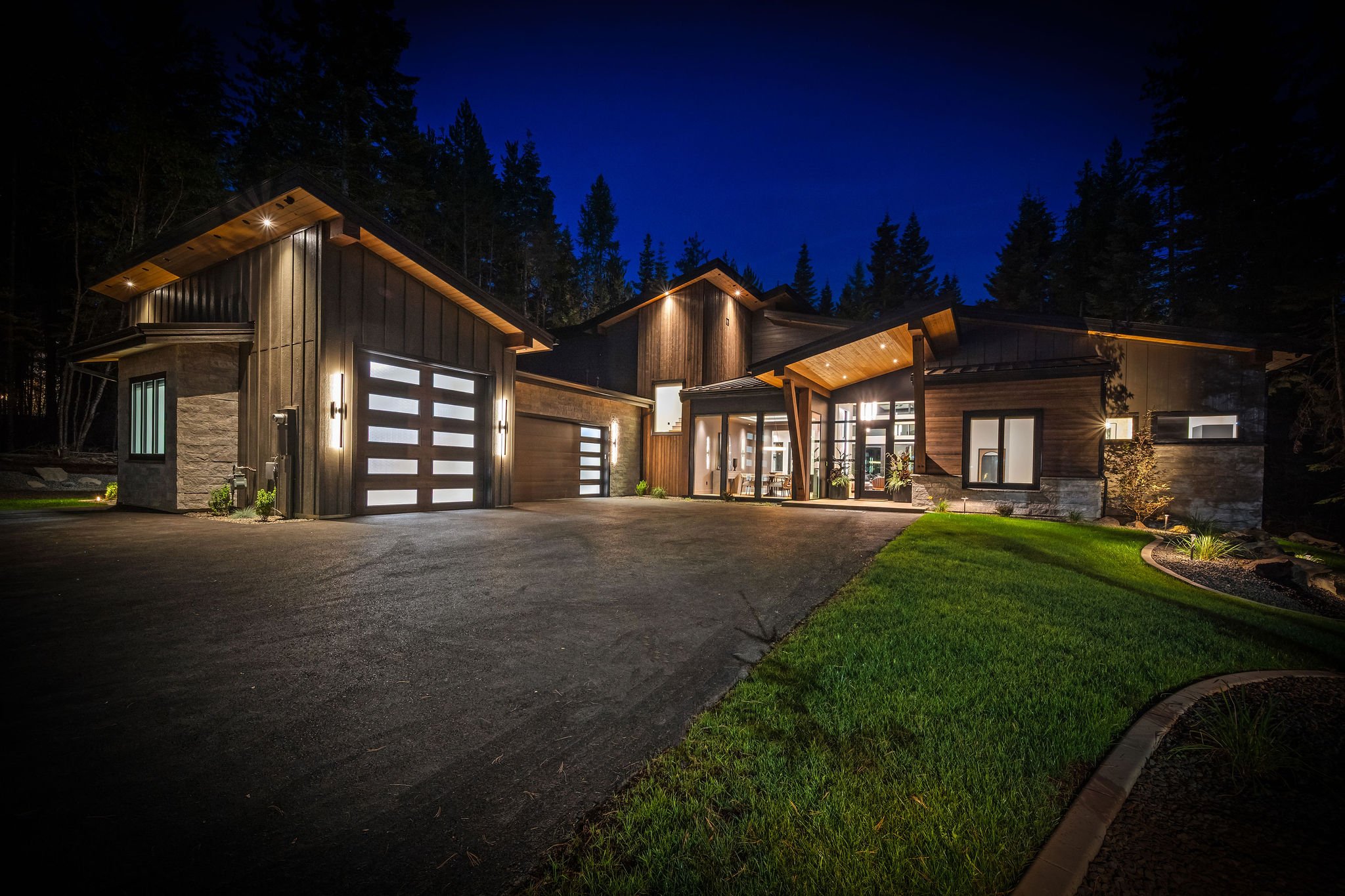 exterior view of illuminated luxury home at night