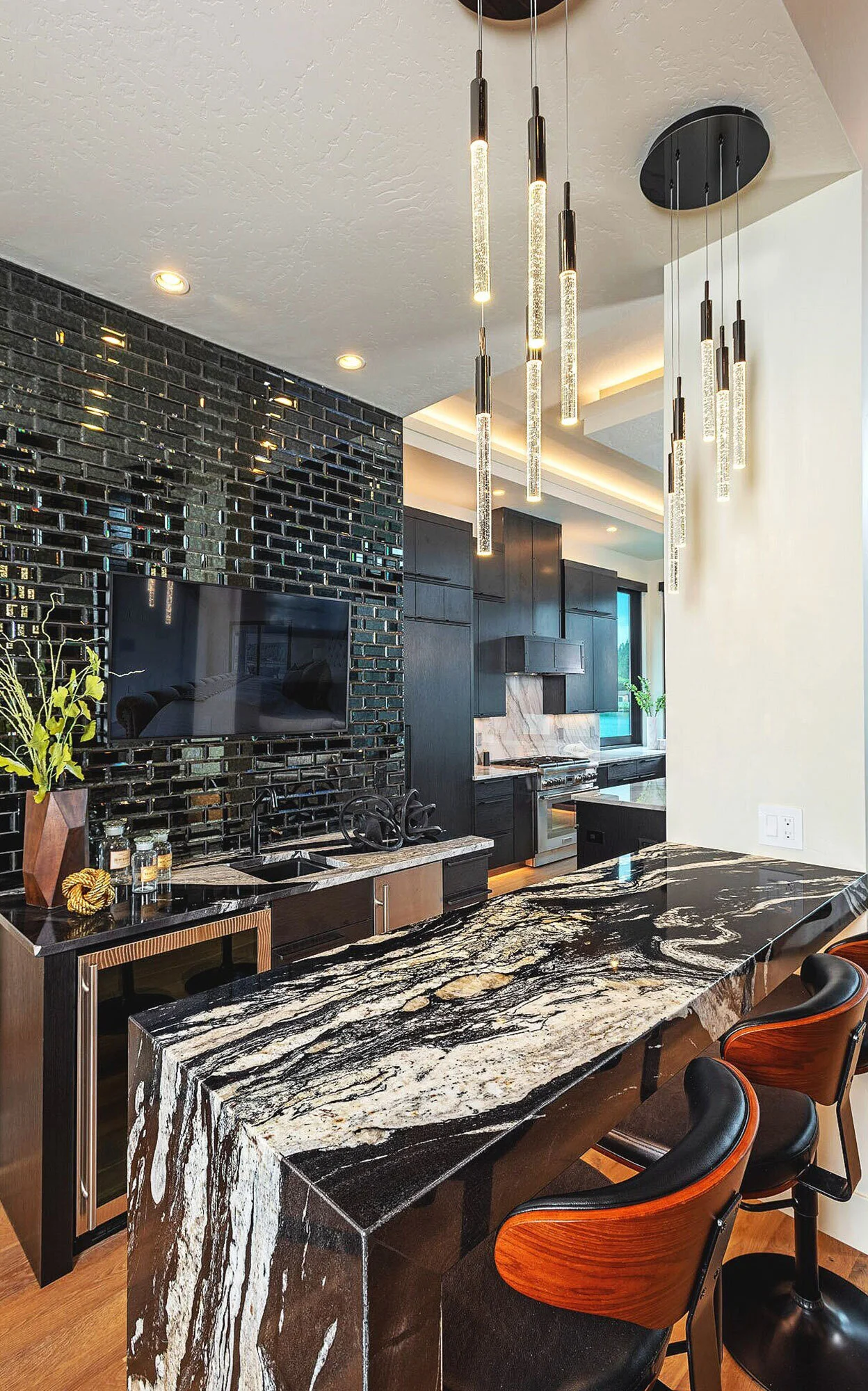 luxury kitchen with marble and black finishes