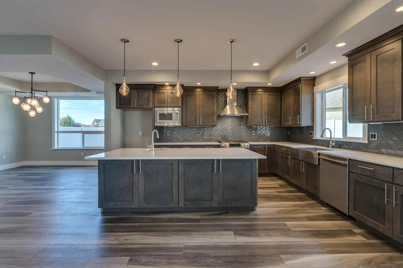 dining room and kitchen in luxurious custom modern home