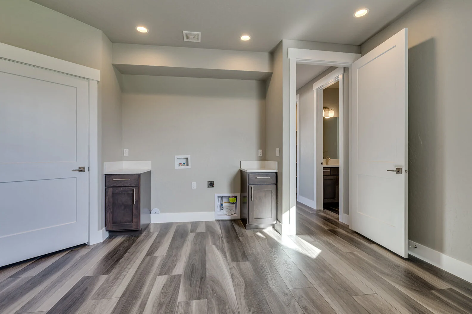 large utility room in luxurious custom modern home